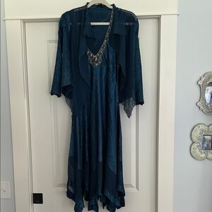 Elegant Teal Dress with Beaded Necklace